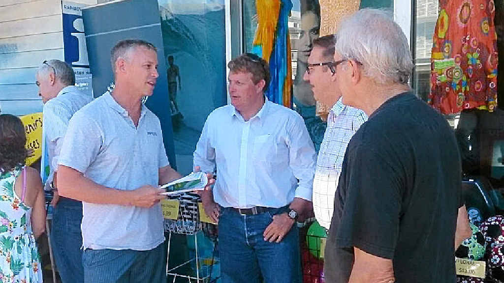 Independent candidate for Gympie Scott Elms talks with principal planner Bill MacFarlane and Member for Gympie David Gibson at Rainbow Beach. Independent candidate for Gympie Scott Elms talks with principal planner Bill MacFarlane and Member for Gympie David Gibson at Rainbow Beach.
